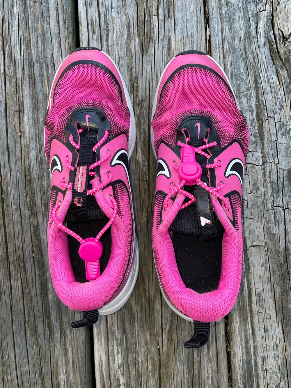 Nike Kids Pink and Black Slip-On Sneakers